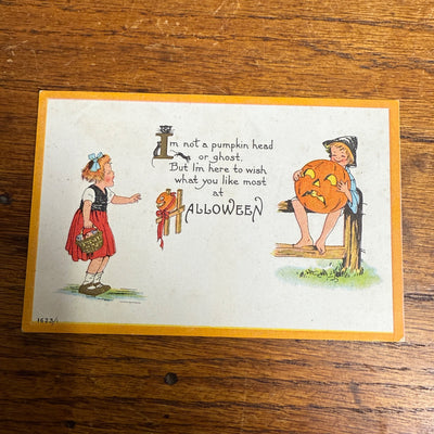 Vintage Halloween Postcard Bergman 1623 JOL Girl Boy on Fence