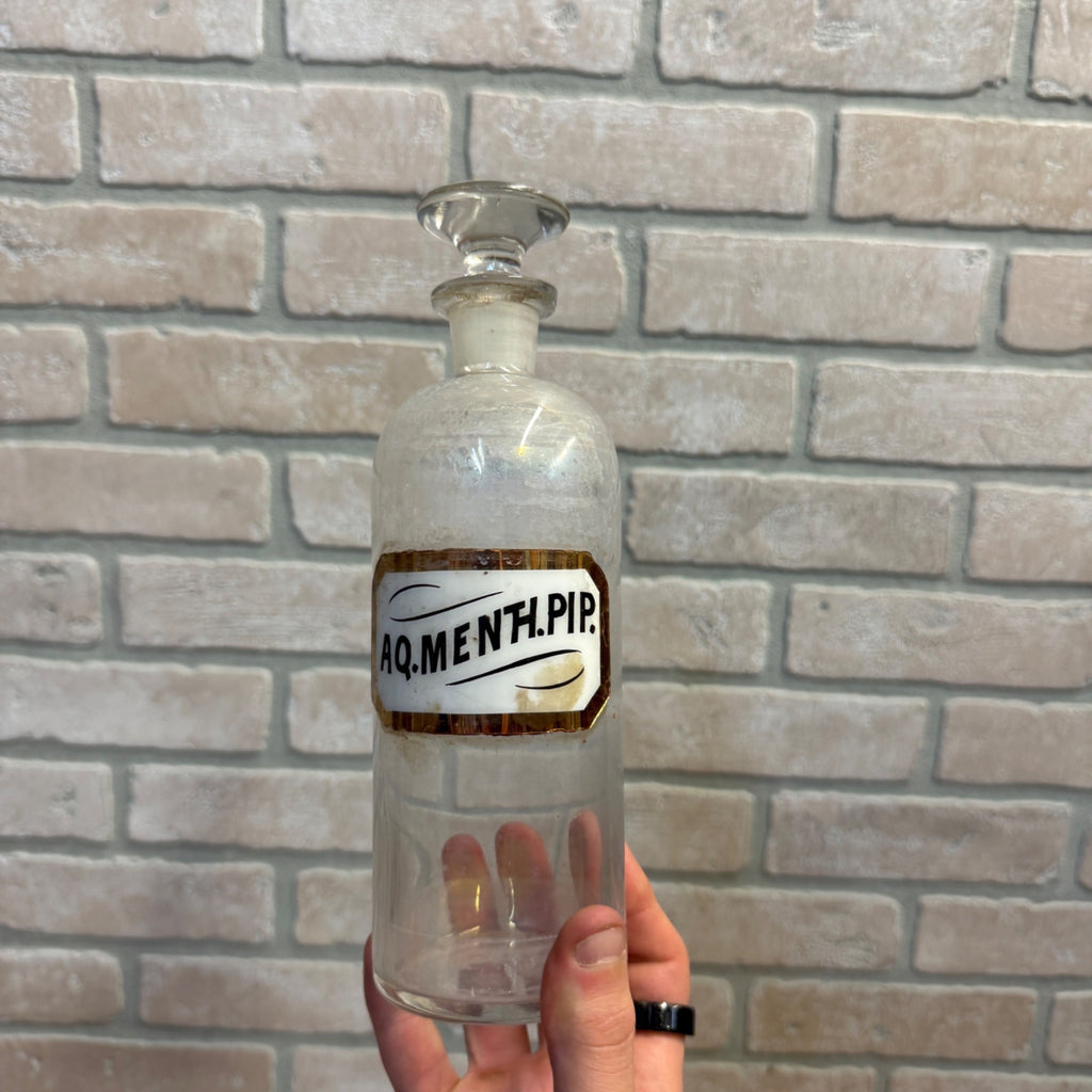 Vintage Glass Pharmacy Apothecary Bottle With Stopper and Glass Label Reading AQ. Menth. Pip. (Tincture of Peppermint)