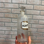 Vintage Glass Pharmacy Apothecary Bottle With Stopper and Glass Label Reading AQ. Menth. Pip. (Tincture of Peppermint)