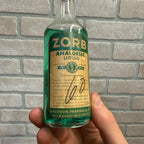 Vintage Zorb, Pharmacy Analgesic Liquid Glass clear Bottle. Wisconsin Company