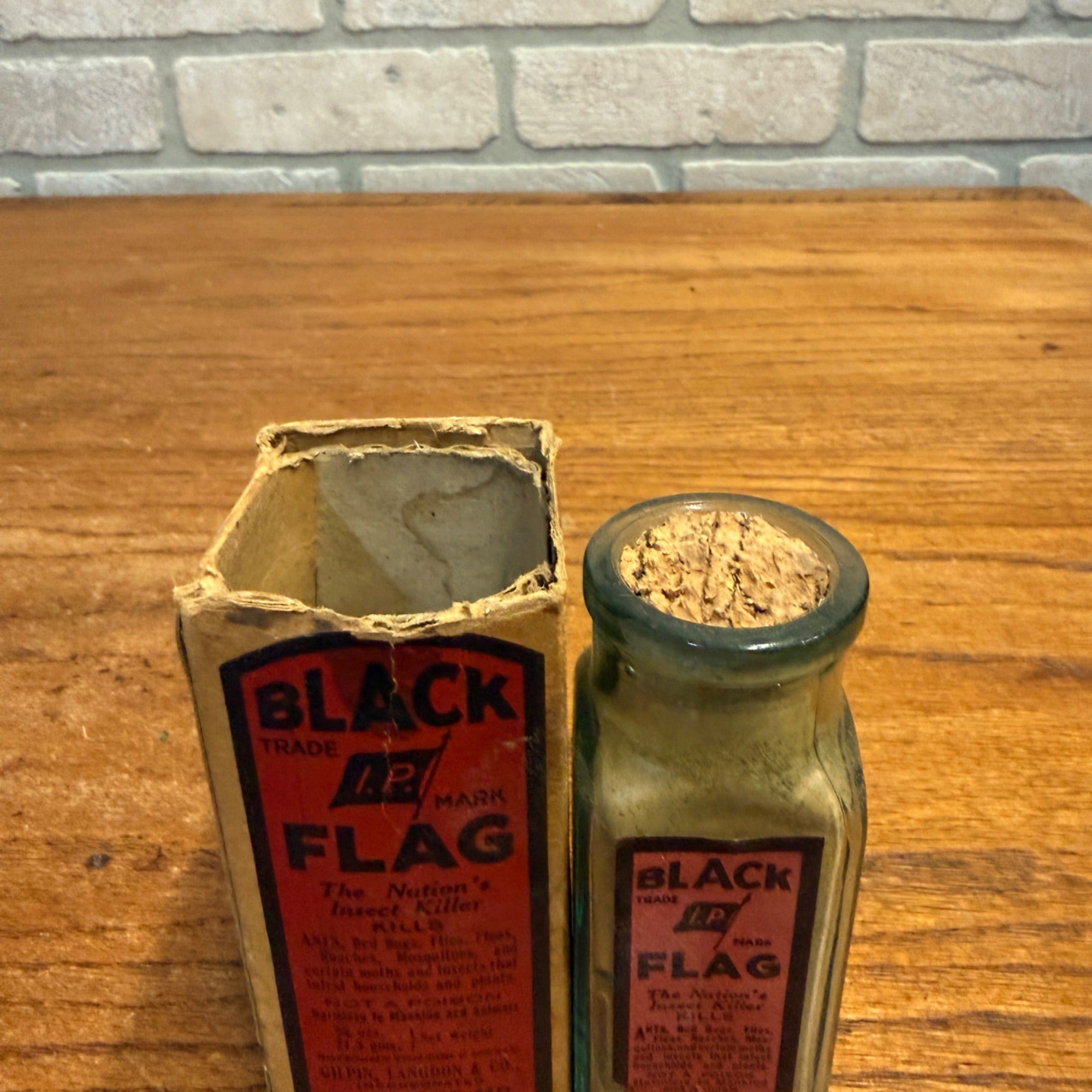 Vintage Black Flag Insect Powder Glass Bottle With Paper Label Baltimore, MD.