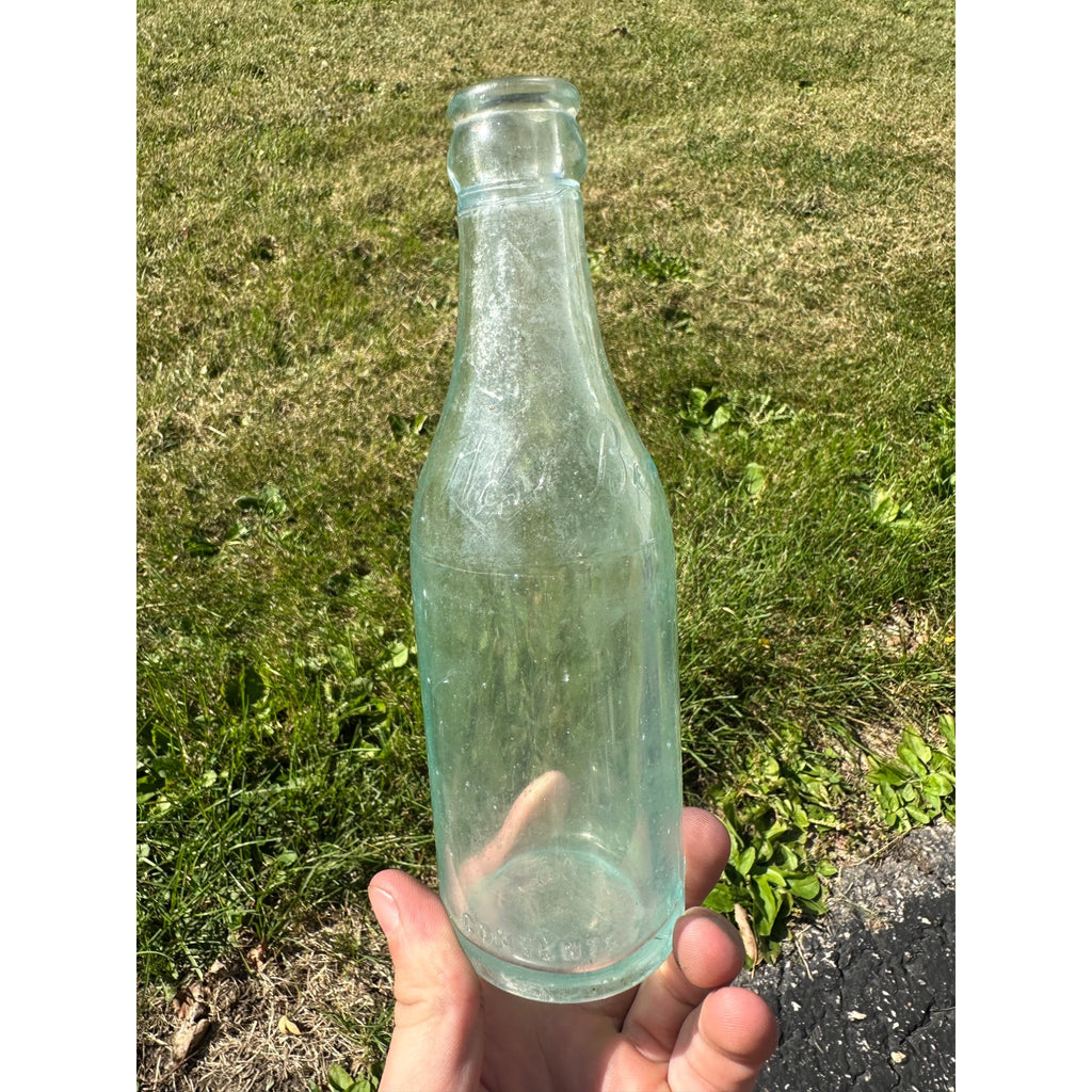 Vintage West Bend Beverages 7oz Embossed Soda Pop Bottle West Bend, Wisconsin