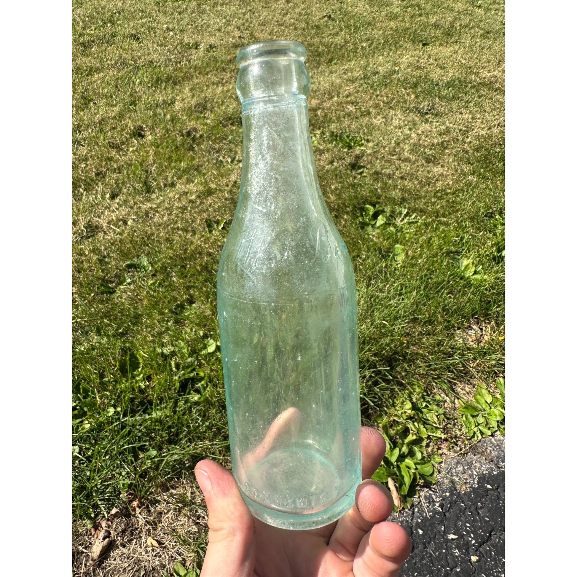 Vintage West Bend Beverages 7oz Embossed Soda Pop Bottle West Bend, Wisconsin