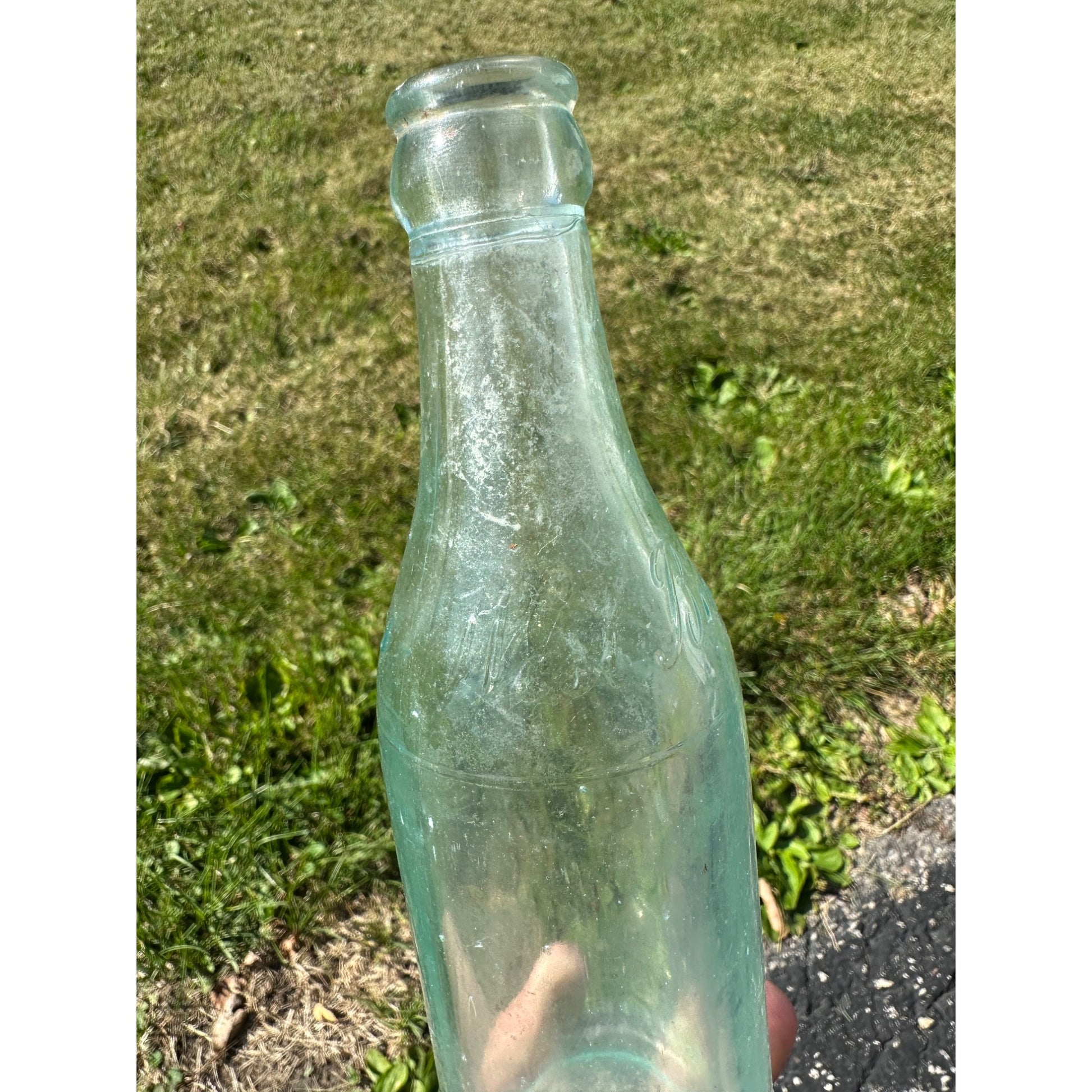 Vintage West Bend Beverages 7oz Embossed Soda Pop Bottle West Bend, Wisconsin