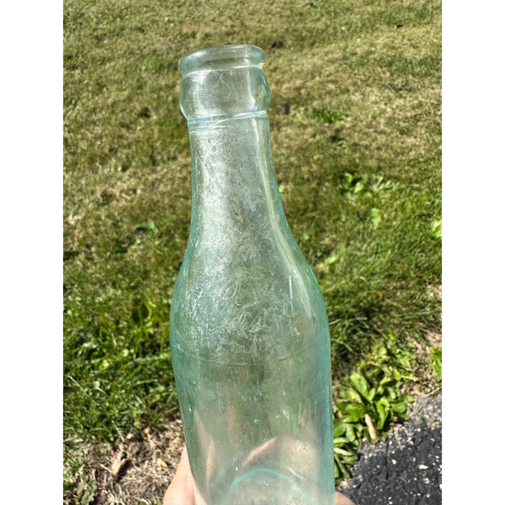 Vintage West Bend Beverages 7oz Embossed Soda Pop Bottle West Bend, Wisconsin