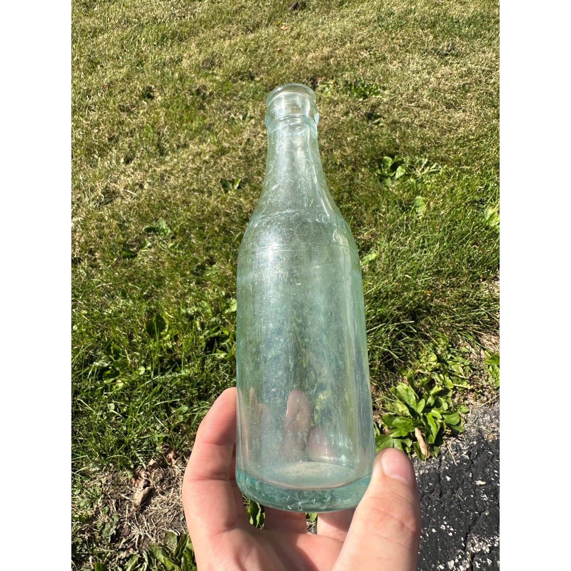 Vintage West Bend Beverages 7oz Embossed Soda Pop Bottle West Bend, Wisconsin
