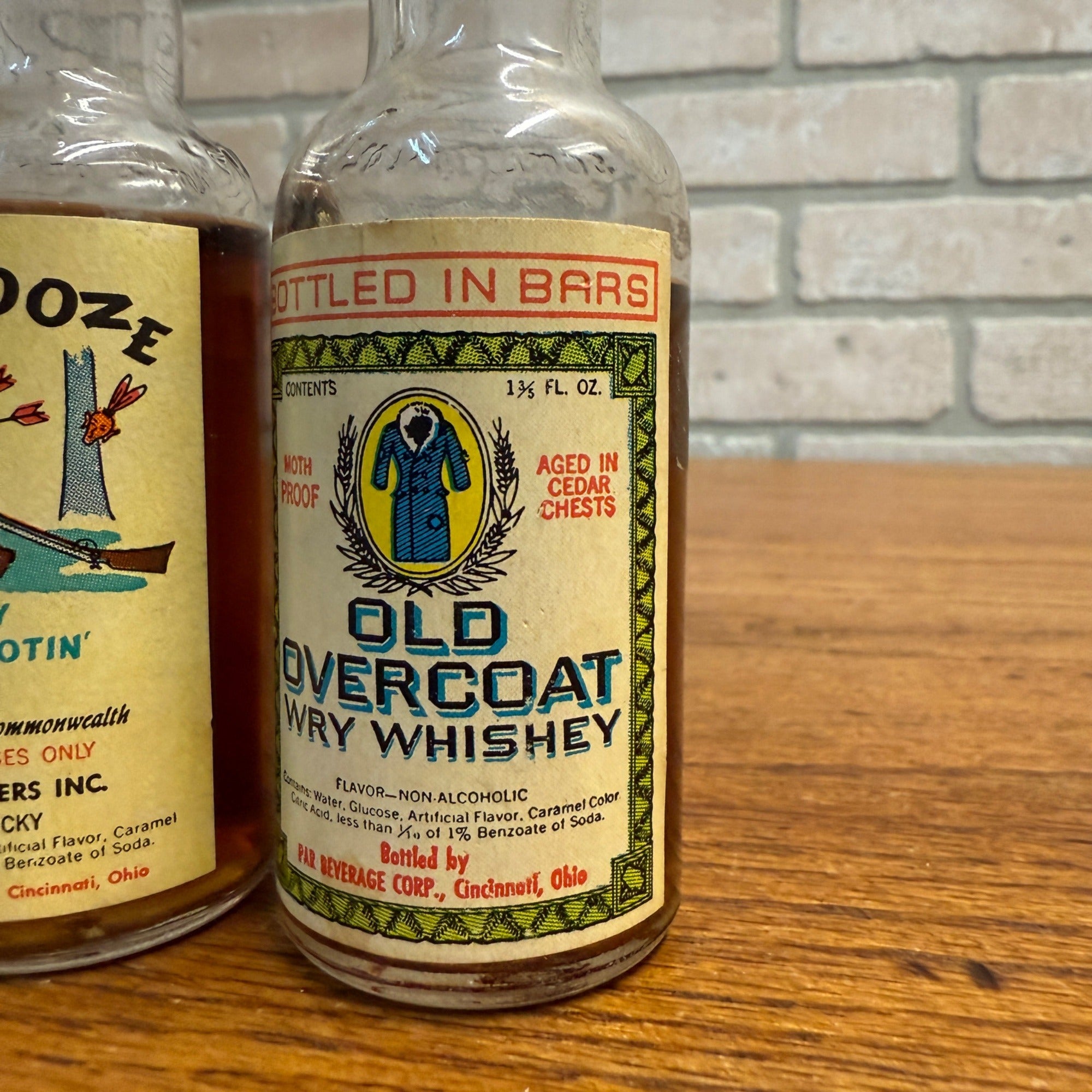 Vintage Novelty Bottles Daniel Booze Kentucky Feud Oil & Overcoat Par Beverage