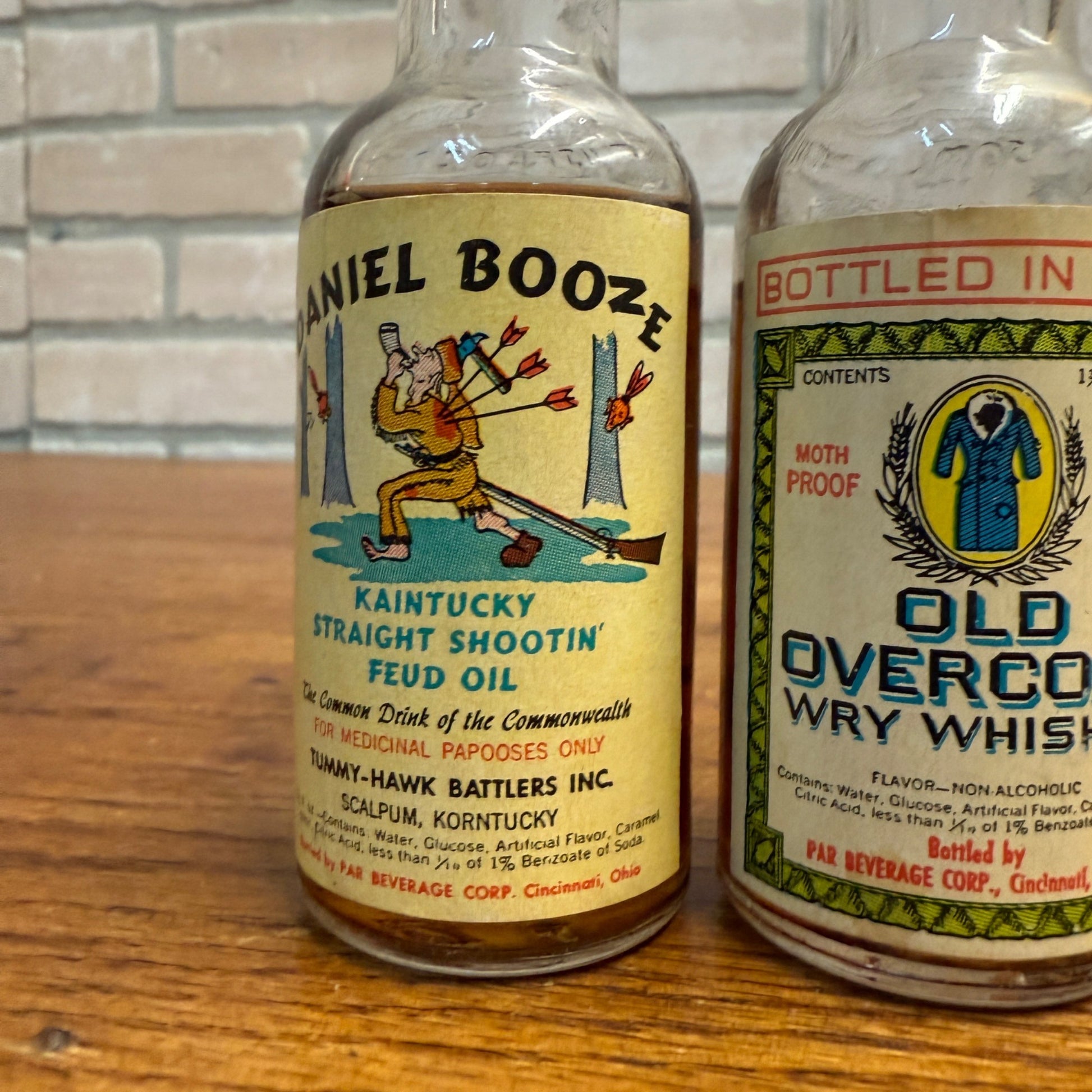 Vintage Novelty Bottles Daniel Booze Kentucky Feud Oil & Overcoat Par Beverage