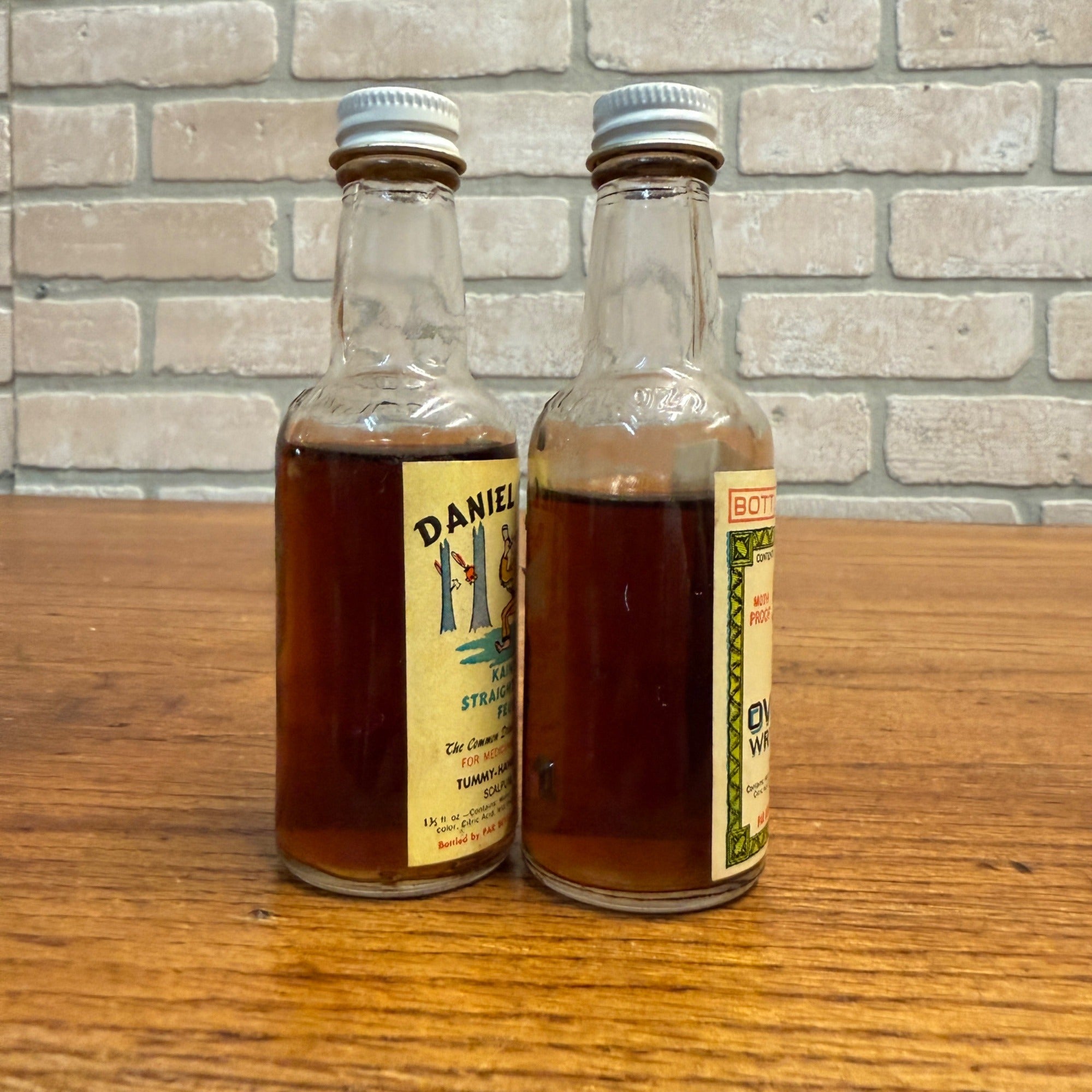 Vintage Novelty Bottles Daniel Booze Kentucky Feud Oil & Overcoat Par Beverage