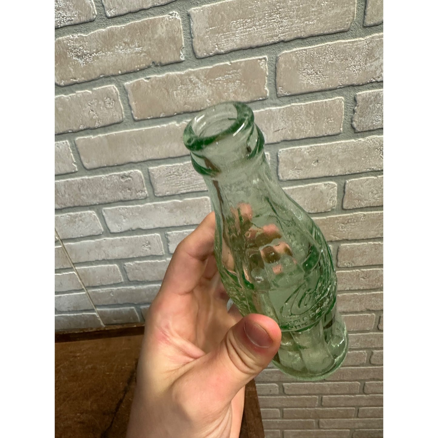 VINTAGE COCA COLA HEAVY 8 OZ GREEN EMBOSSED GLASS SODA BOTTLE - RHINELANDER WI