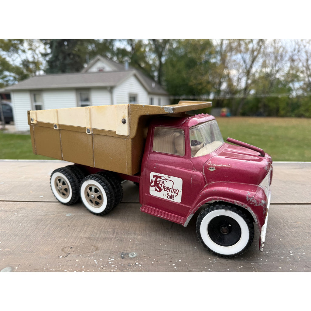 Vintage 1950s Ertl International Touch Steering IH Dump Truck Metal Toy
