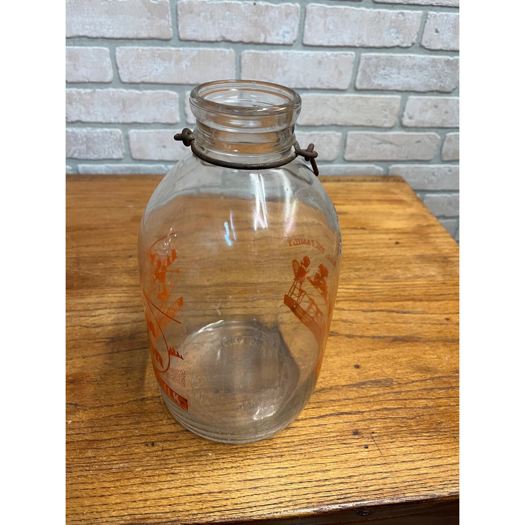 Antique Dairy Specialties Chicago Gallon Milk Bottle ACL Orange Skiing Graphics