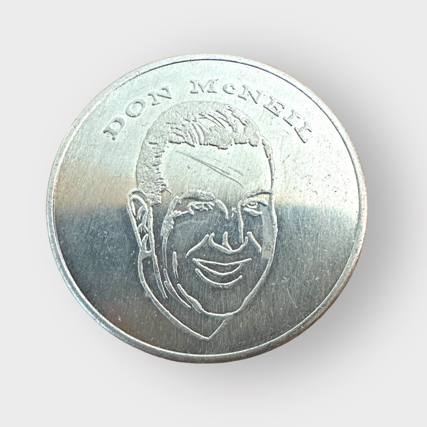 Vintage Don McNeil Aluinum Token 31mm "Caricature Dies Same Price..."