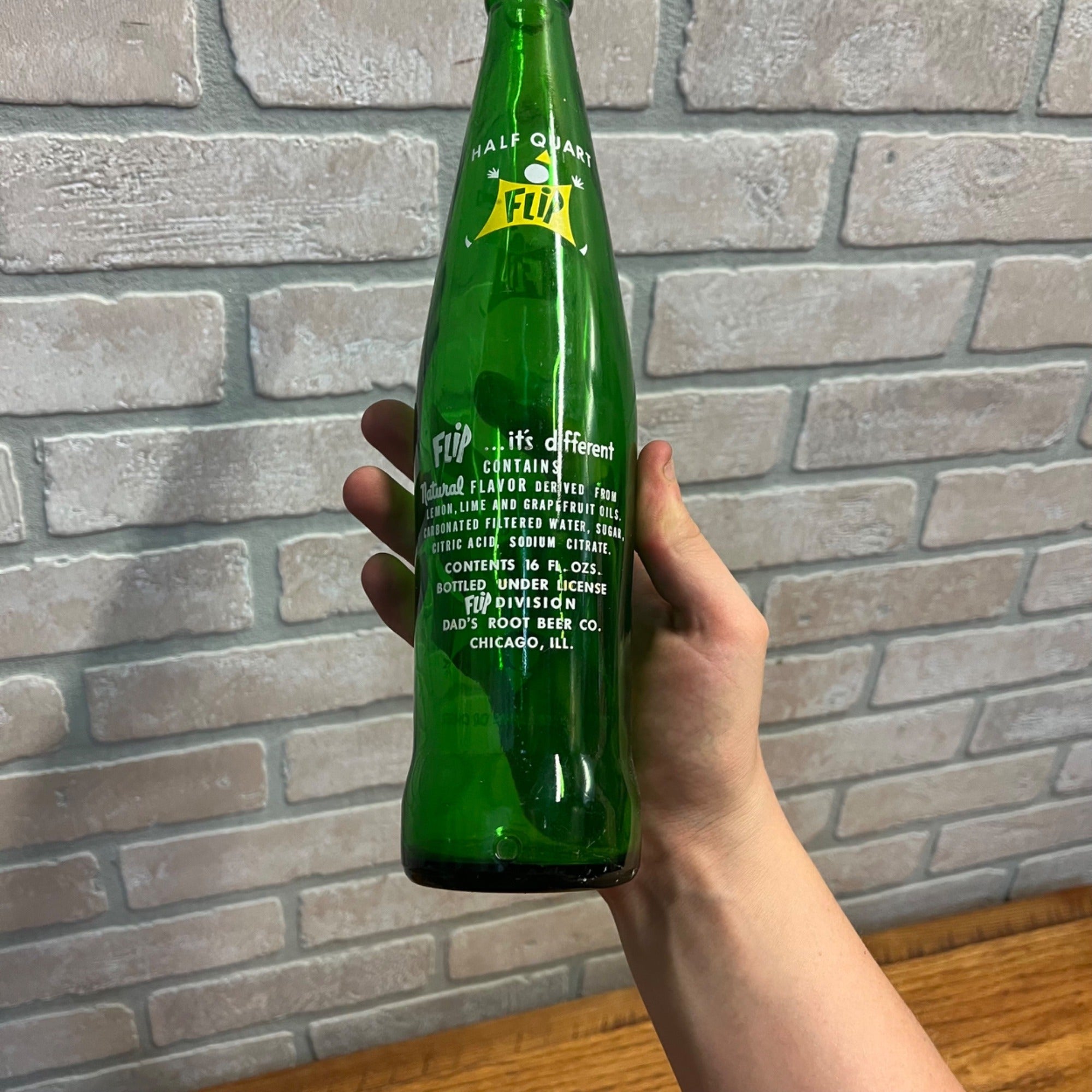 Flip Soda Bottle. Dad's Bottling Co. of Chicago; 2-color ACL Half Quart size