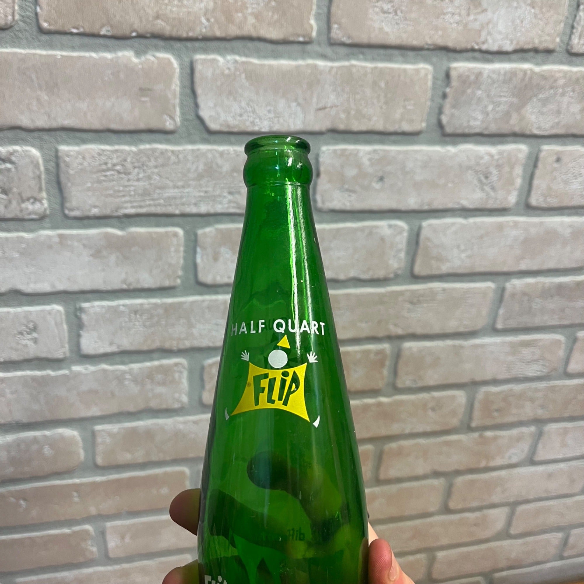 Flip Soda Bottle. Dad's Bottling Co. of Chicago; 2-color ACL Half Quart size