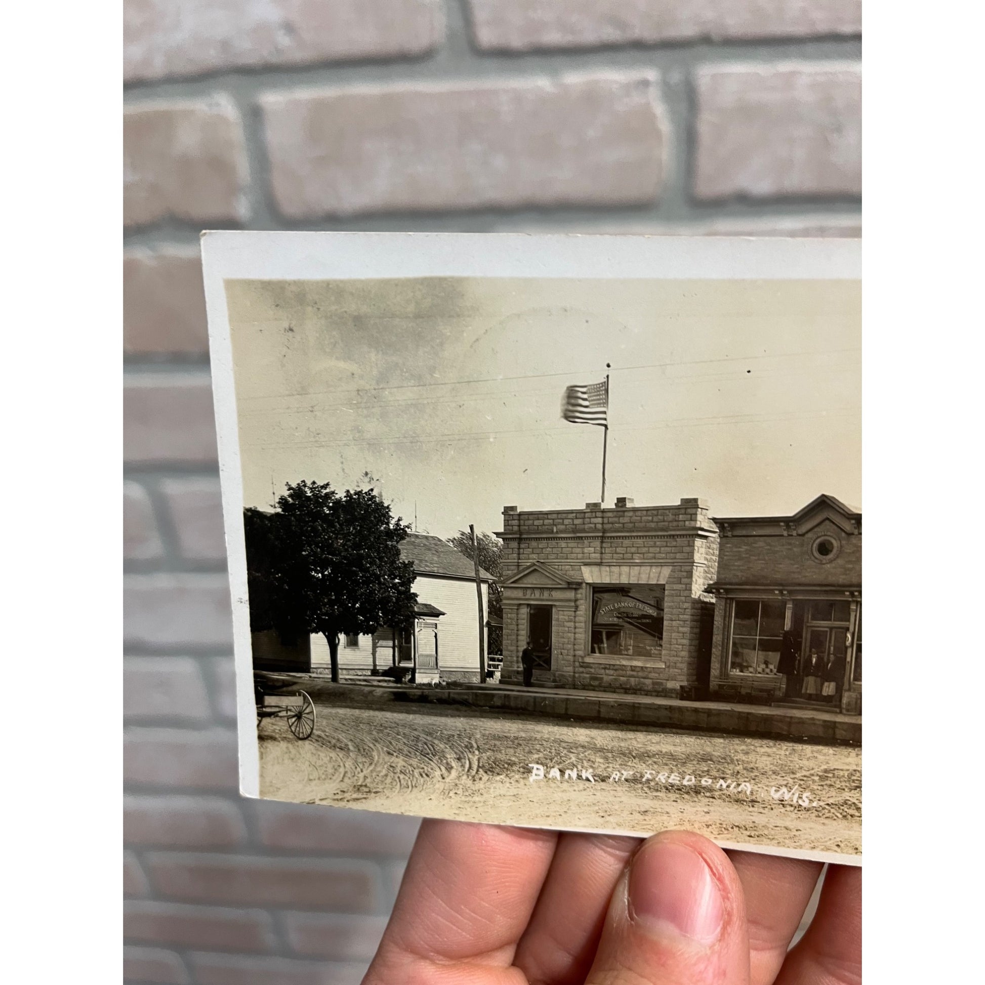 RPPC Postcard -- Fredonia Wisconsin - Bank Building Street Scene c1919