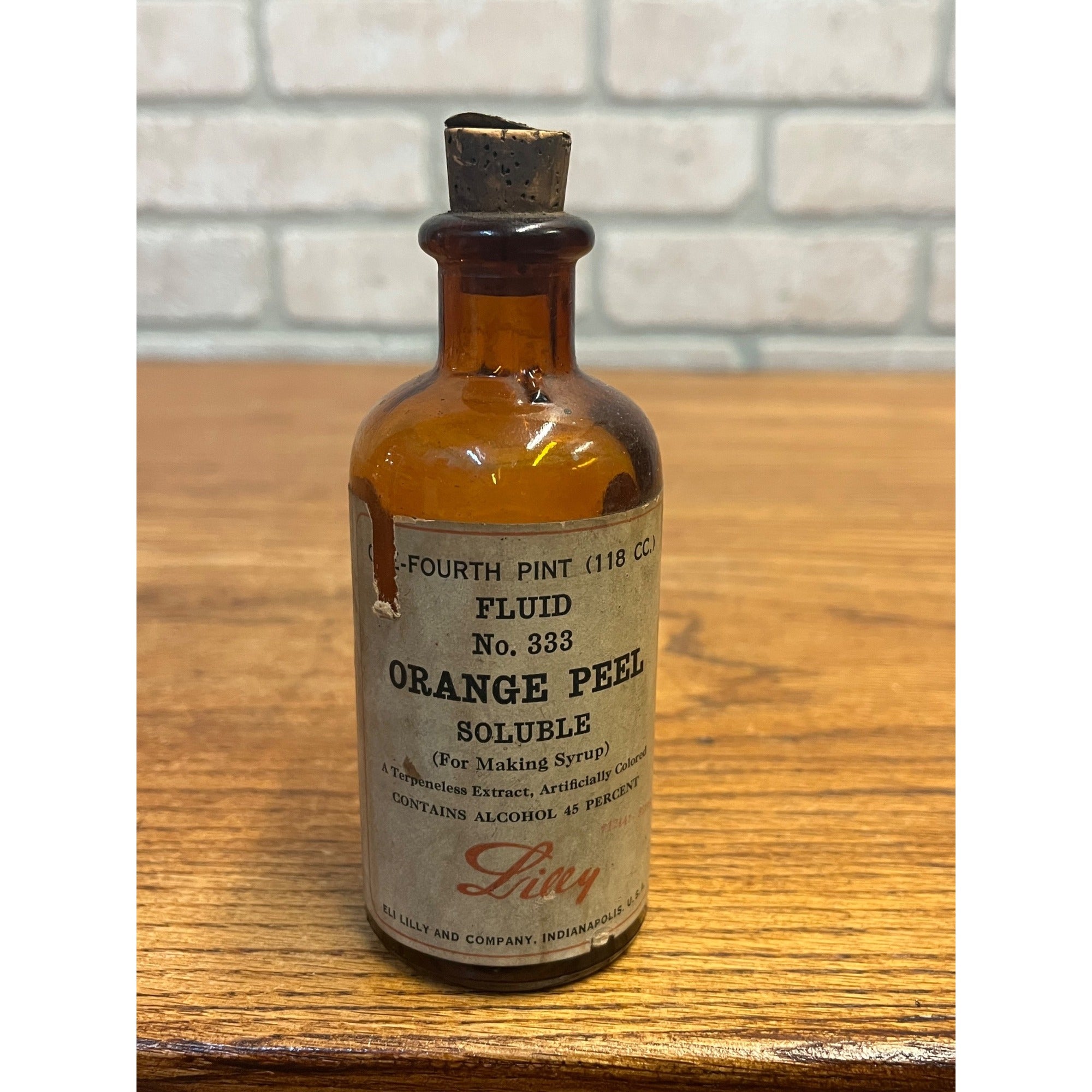Vintage Eli Lilly Orange Peel Fluid Pharmacy Druggist Amber Glass Bottle 5"