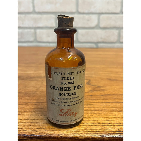 Vintage Eli Lilly Orange Peel Fluid Pharmacy Druggist Amber Glass Bottle 5"