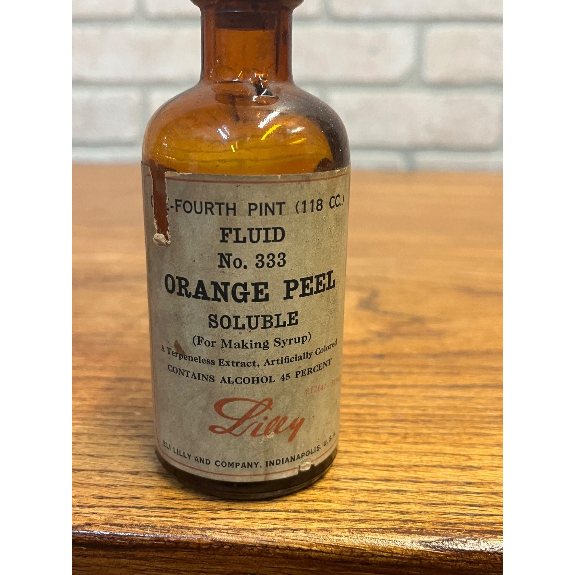 Vintage Eli Lilly Orange Peel Fluid Pharmacy Druggist Amber Glass Bottle 5"