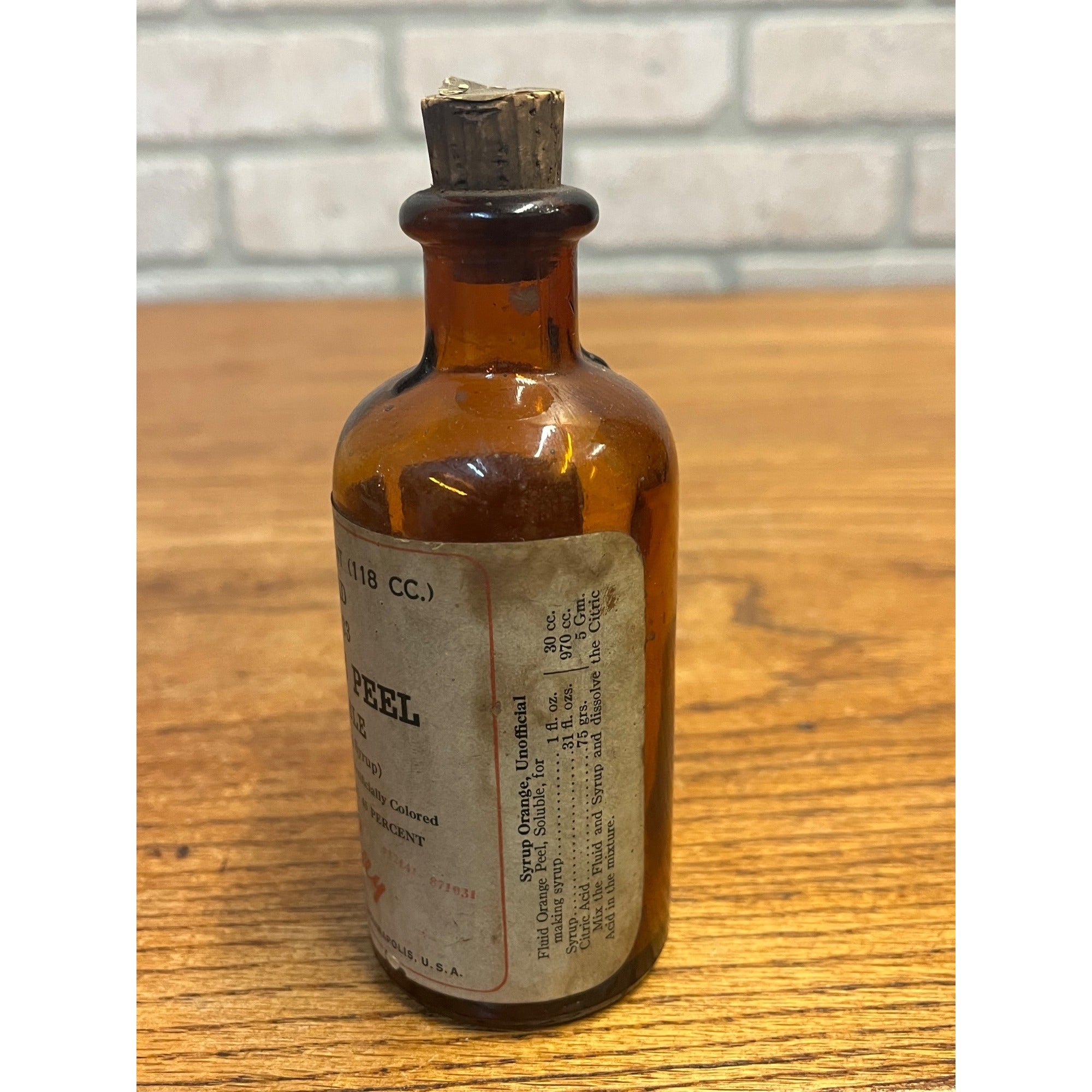 Vintage Eli Lilly Orange Peel Fluid Pharmacy Druggist Amber Glass Bottle 5"
