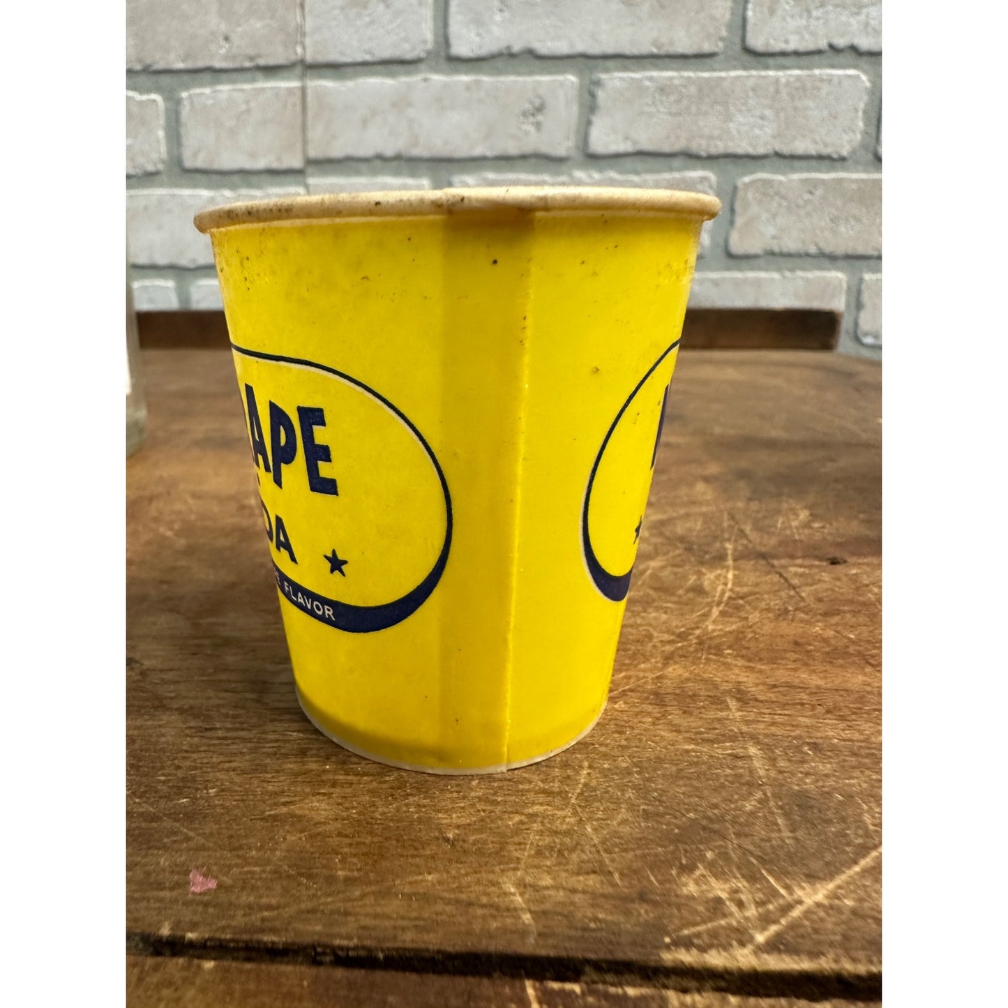 VINTAGE WAX PAPER CUP NUGRAPE SODA POP YELLOW 4OZ