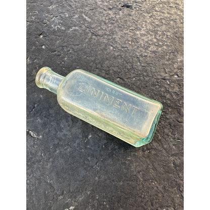 Antique Embossed McLeans Volcanic Liniment Oil Bottle Aqua Blue green