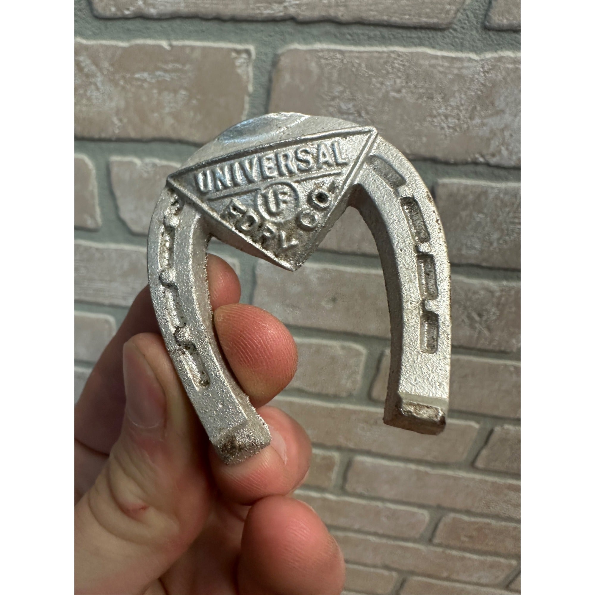 Vintage Advertising Cast Aluminum Horseshoe Universal Foundry Co Oshkosh WI