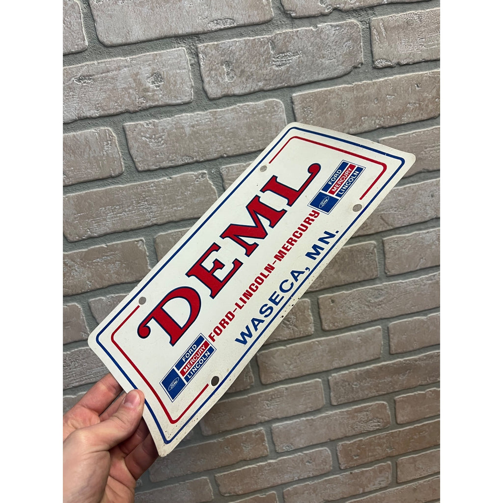Vintage Deml Ford Mercury Lincoln Waseca MN Dealership Booster License Plate