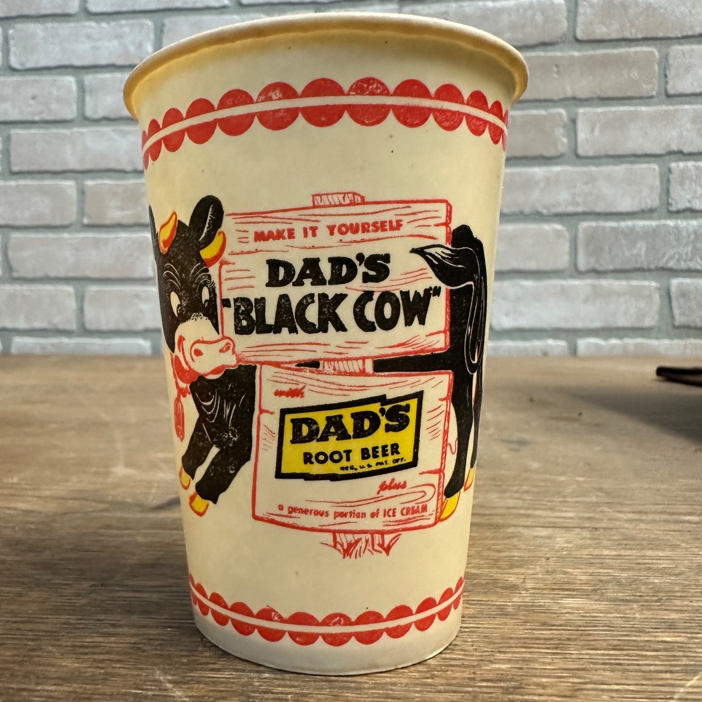 VINTAGE DAD'S ROOT BEER BLACK COW ADVERTISING WAX PAPER CUP