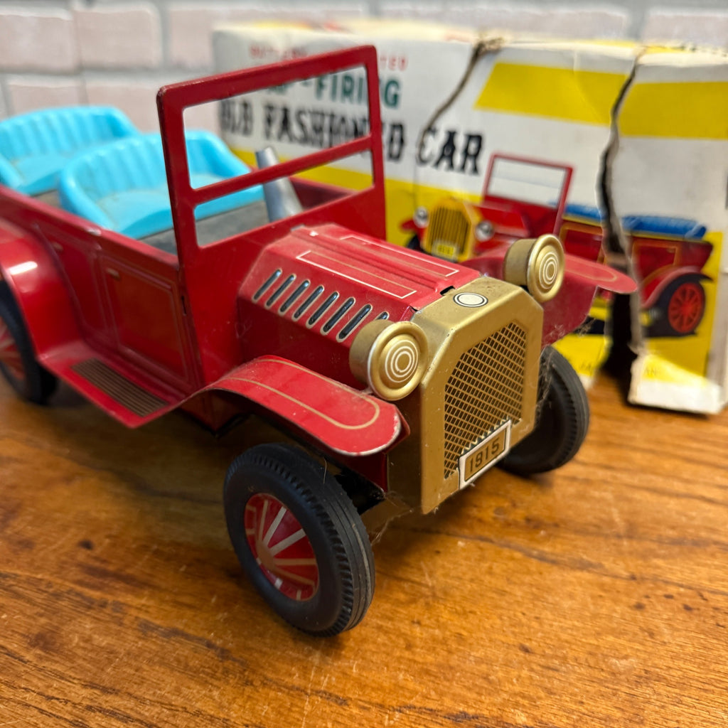 Vintage tin toy CAP-Firing Old Fashioned Car Excentric action Japan united 1950