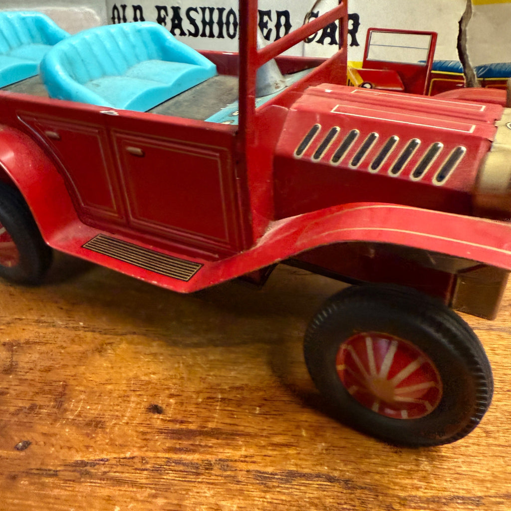 Vintage tin toy CAP-Firing Old Fashioned Car Excentric action Japan united 1950