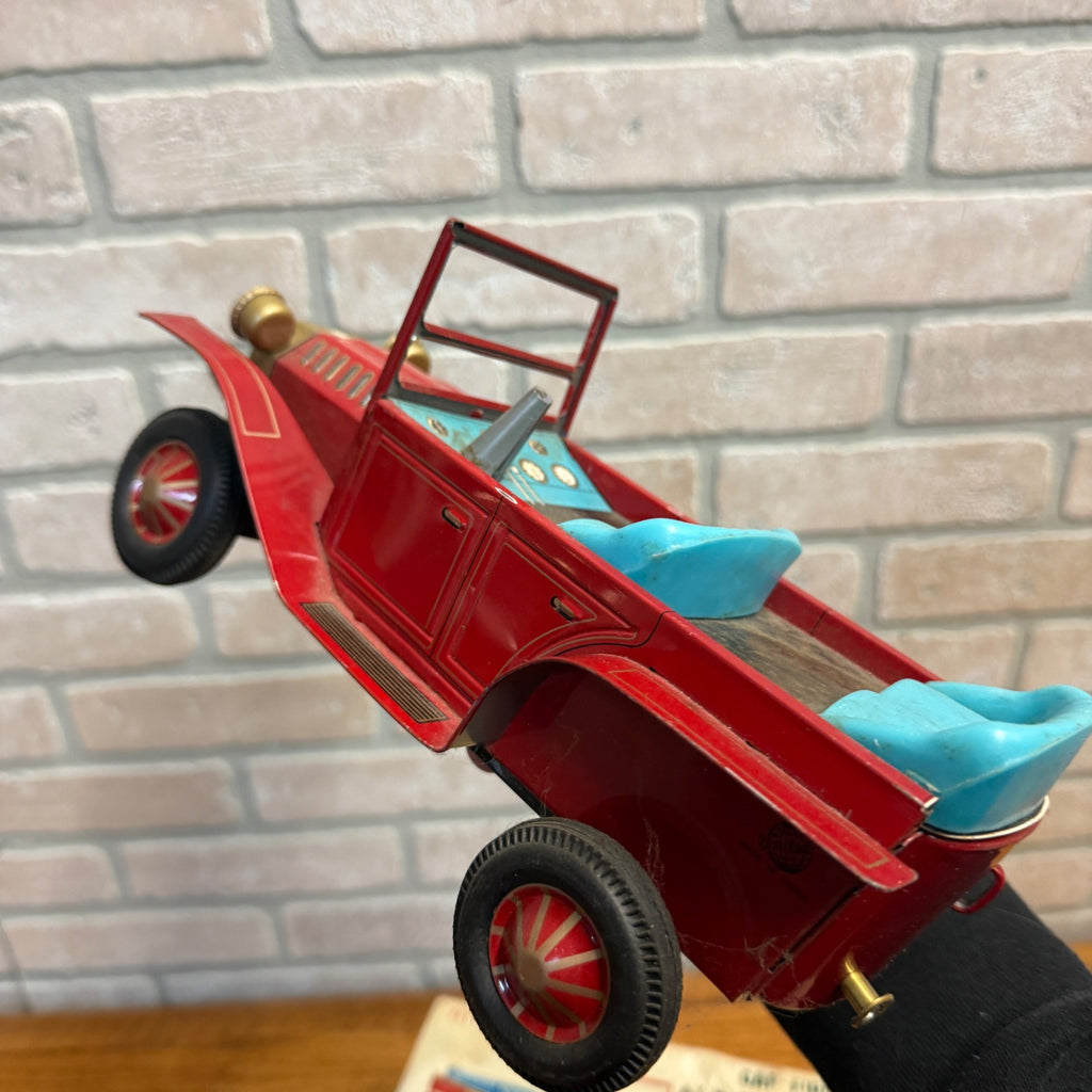 Vintage tin toy CAP-Firing Old Fashioned Car Excentric action Japan united 1950