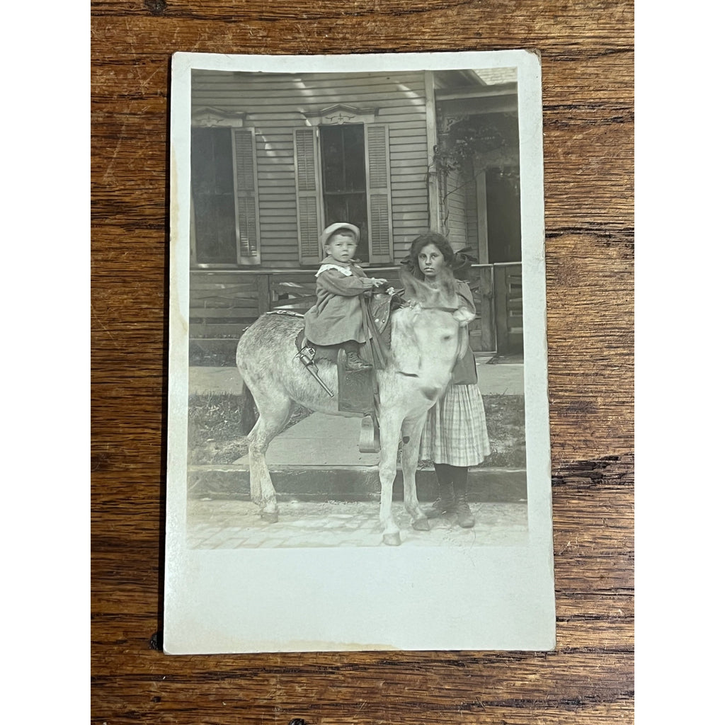 Young Child Riding Donkey Mule Cap Gun Toy RPPC Real Photo Postcard