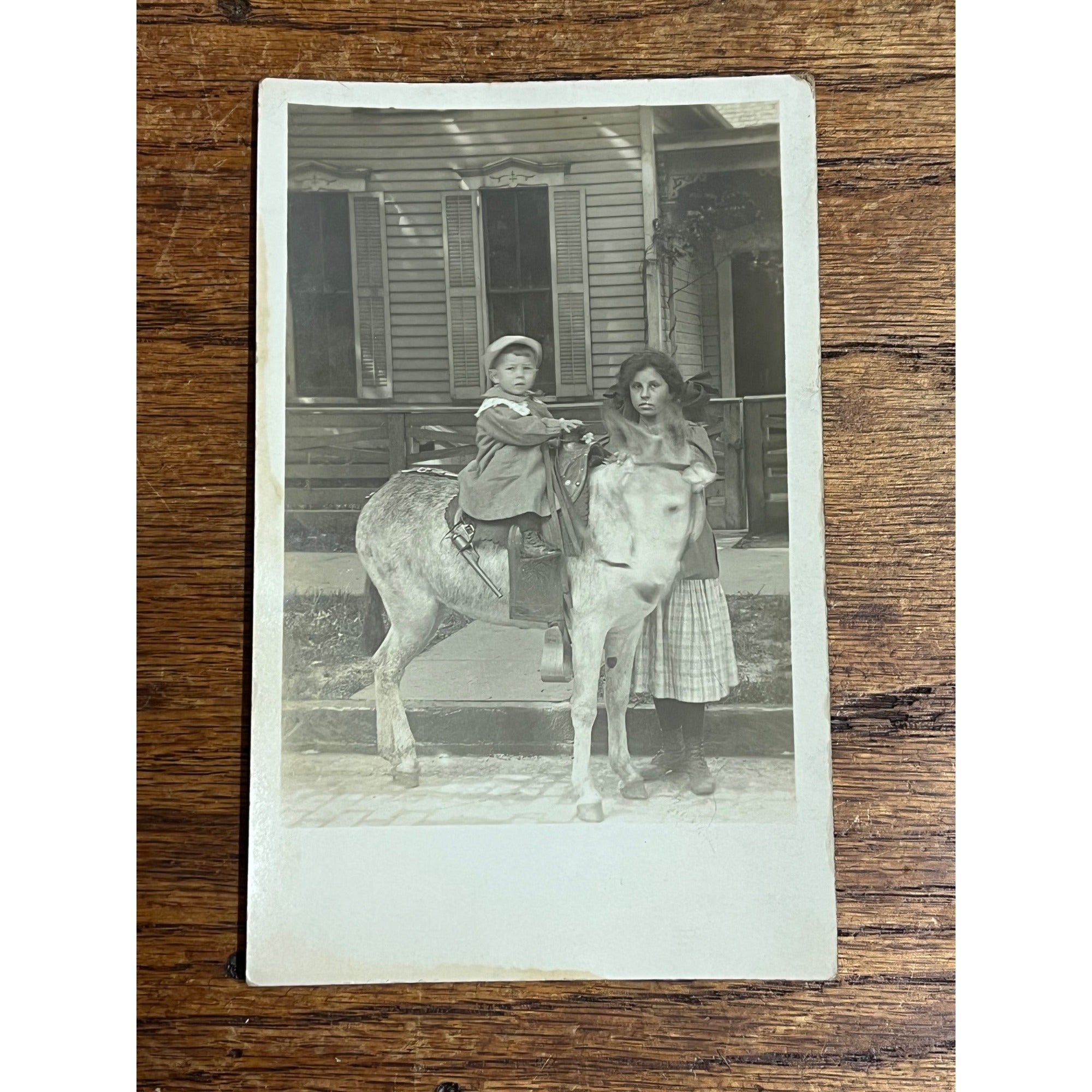 Young Child Riding Donkey Mule Cap Gun Toy RPPC Real Photo Postcard