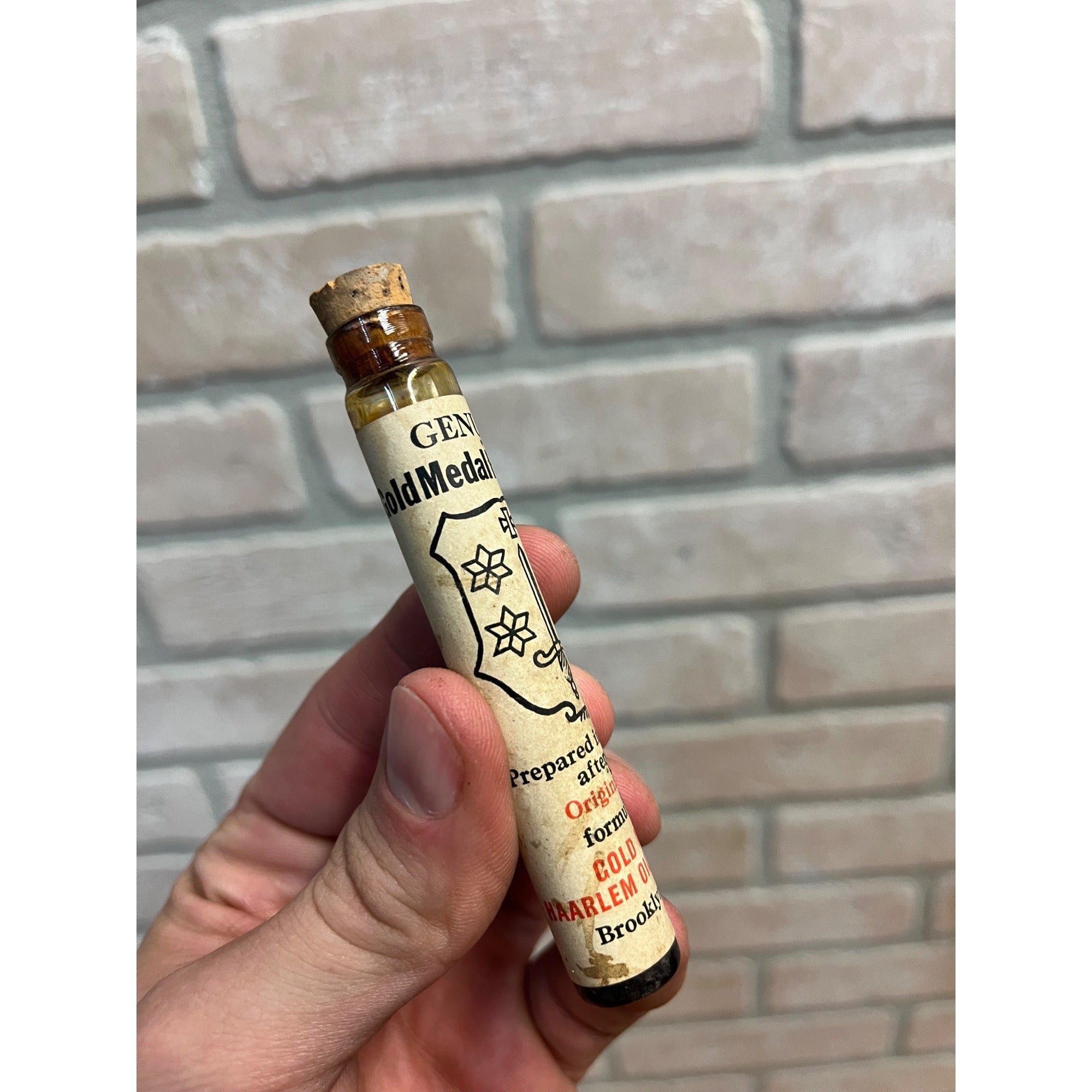 Vintagle Gold Medal Haarlem Oil Labeled Glass Medicine Bottle Tube Full Brooklyn, N.Y.