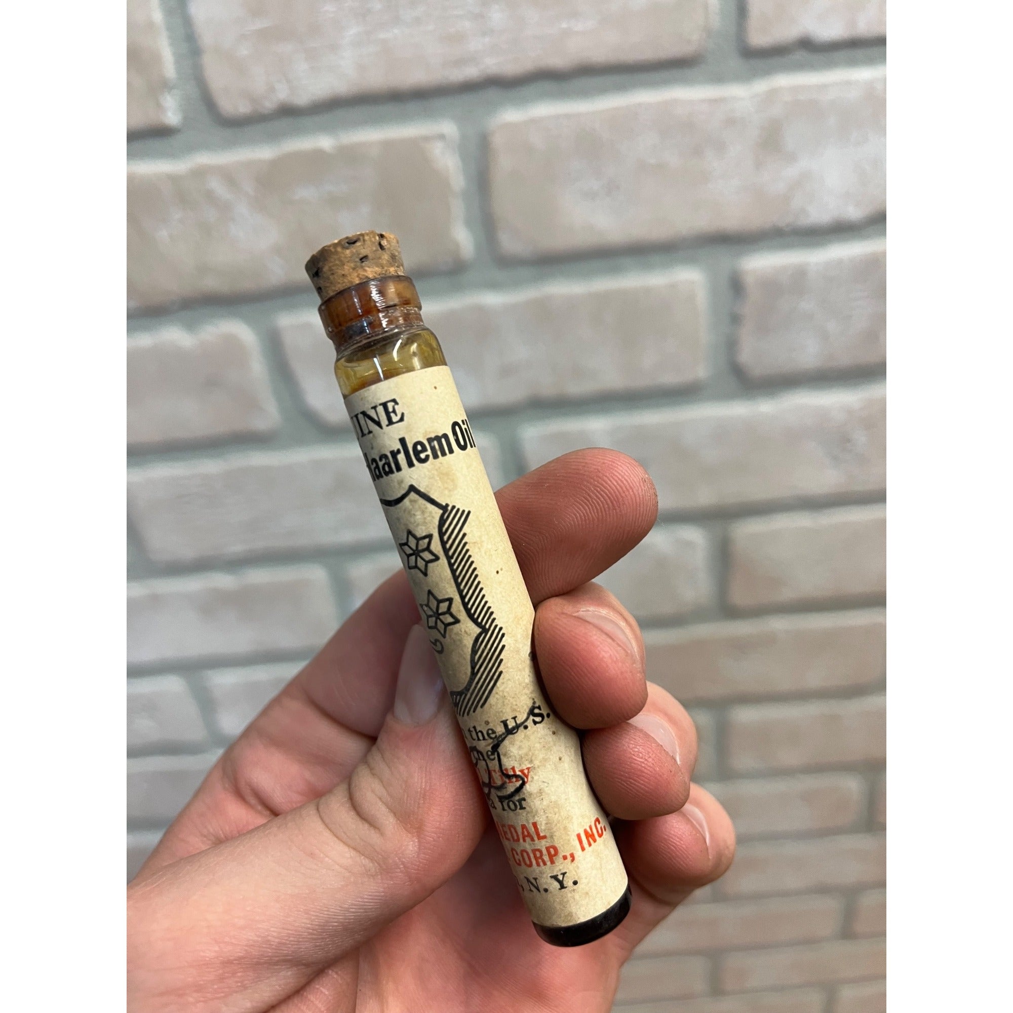 Vintagle Gold Medal Haarlem Oil Labeled Glass Medicine Bottle Tube Full Brooklyn, N.Y.