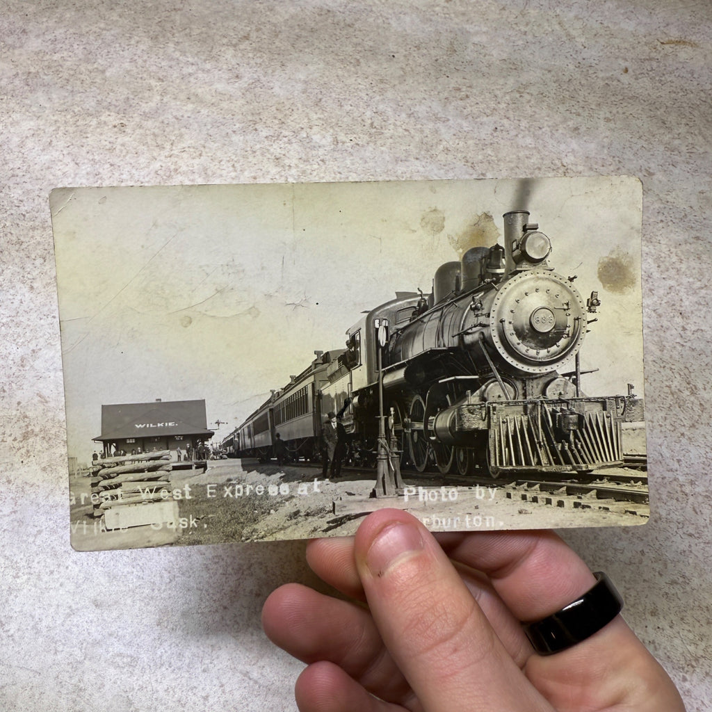 Wilkie, Saskatchewan RPPC Postcard Canada Railroad Train Depot West Express
