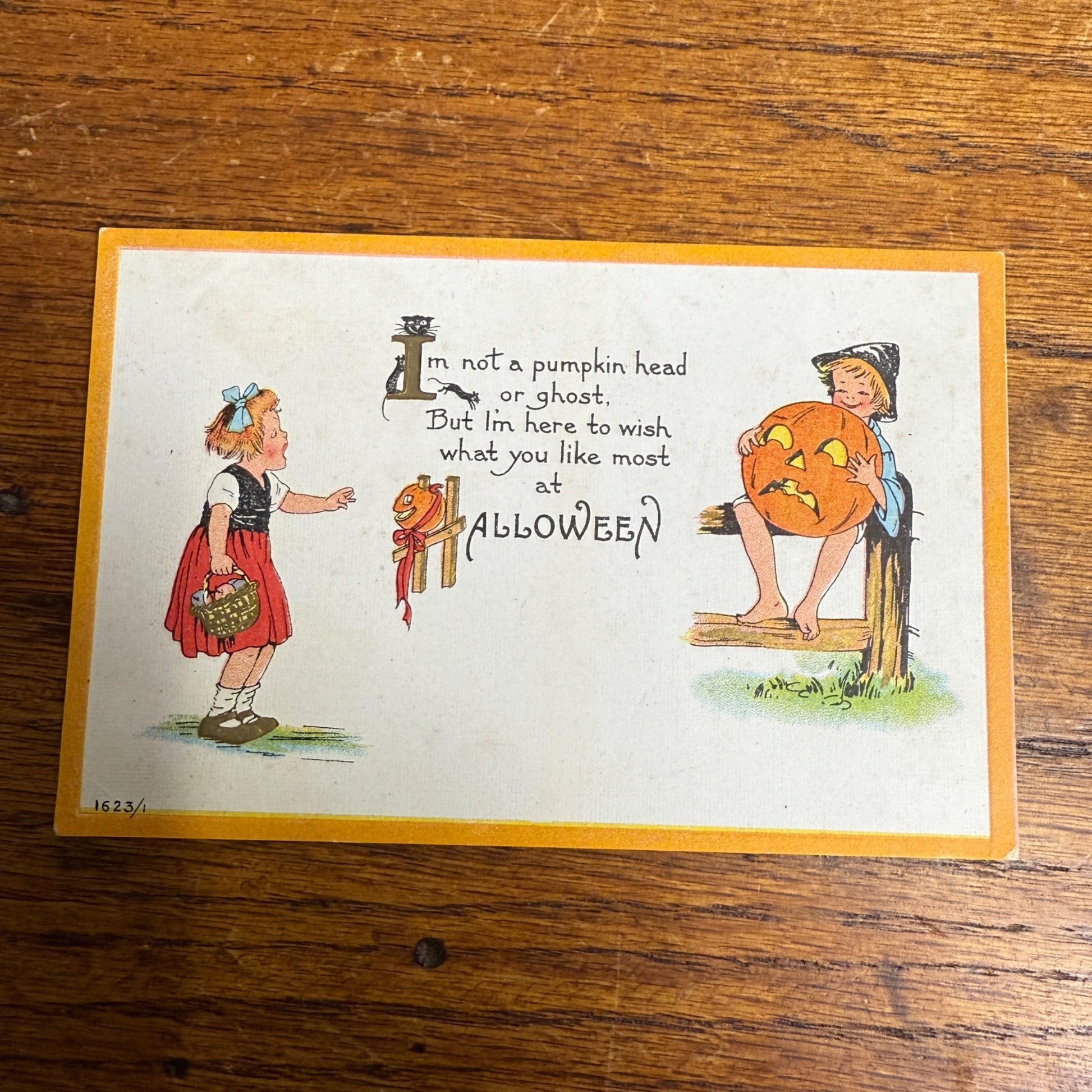 Vintage Halloween Postcard Bergman 1623 JOL Girl Boy on Fence