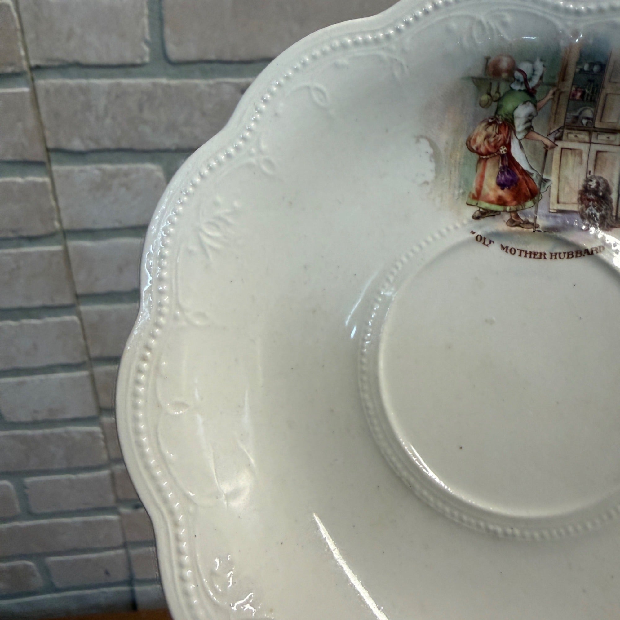 Vintage "Old Mother Hubbard" Saucer By IRIS E.P.P. Co. Embossed Design Scalloped Edge Decor