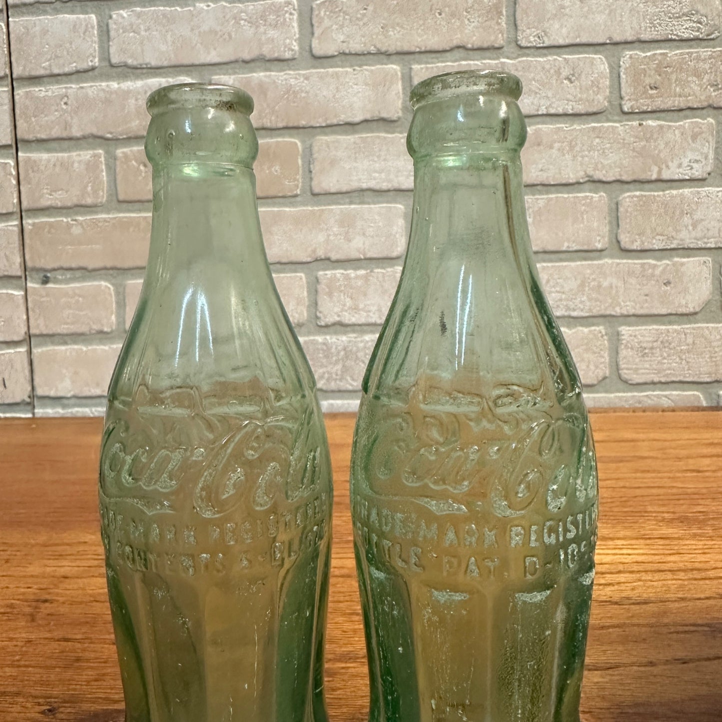 (2) Vintage Coca Cola Bottle Oshkosh WI Embossed 6 Fl Oz Hobbleskirt (1938-51)