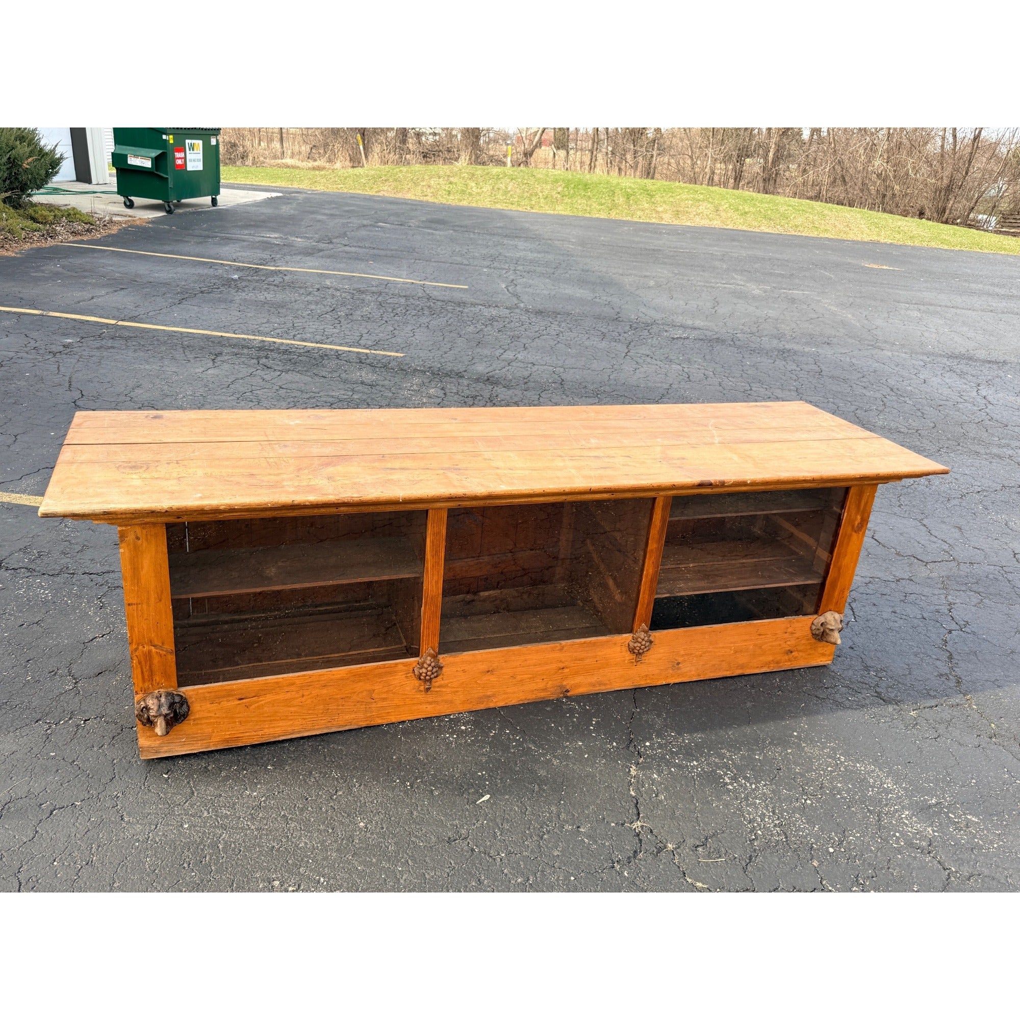 Antique 8ft General Store Display Counter Cabinet w/ Glass, Dog Head & Grape Carvings – c.1900