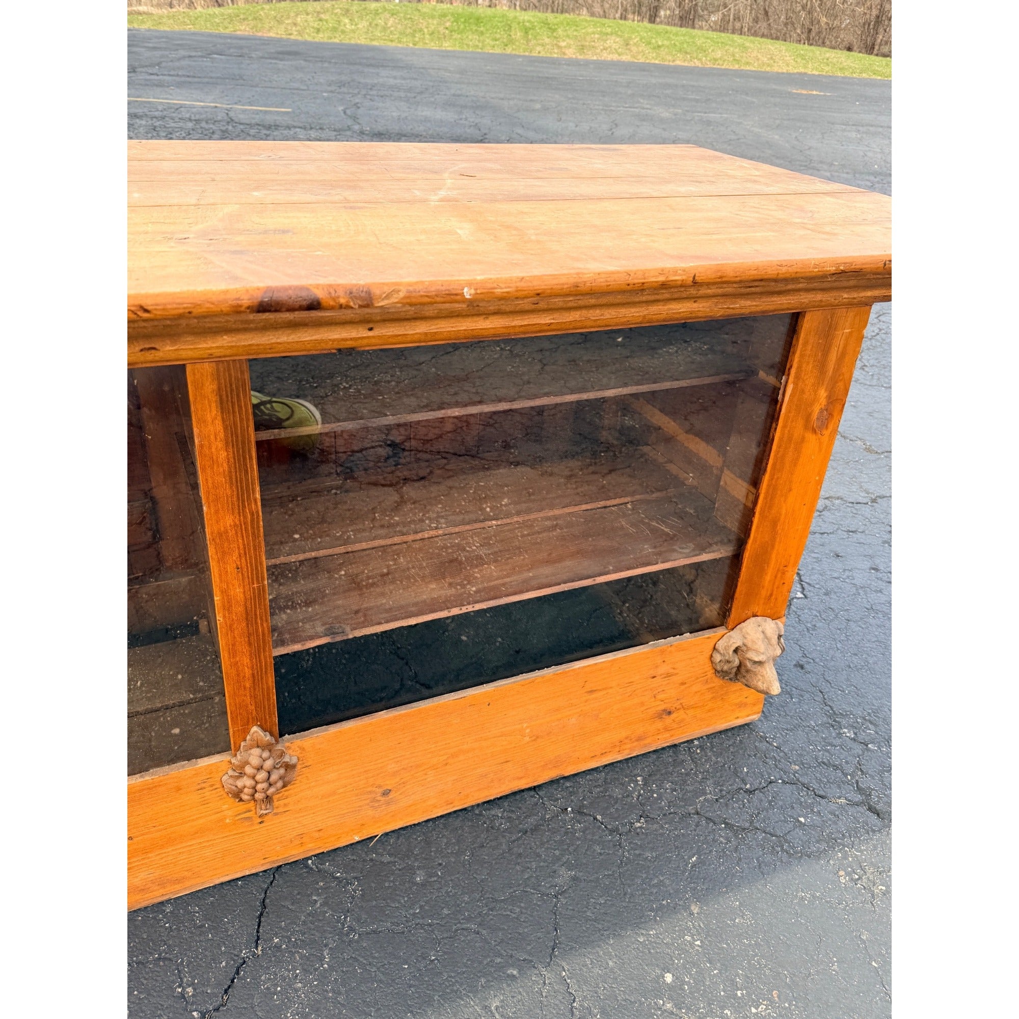 Antique 8ft General Store Display Counter Cabinet w/ Glass, Dog Head & Grape Carvings – c.1900