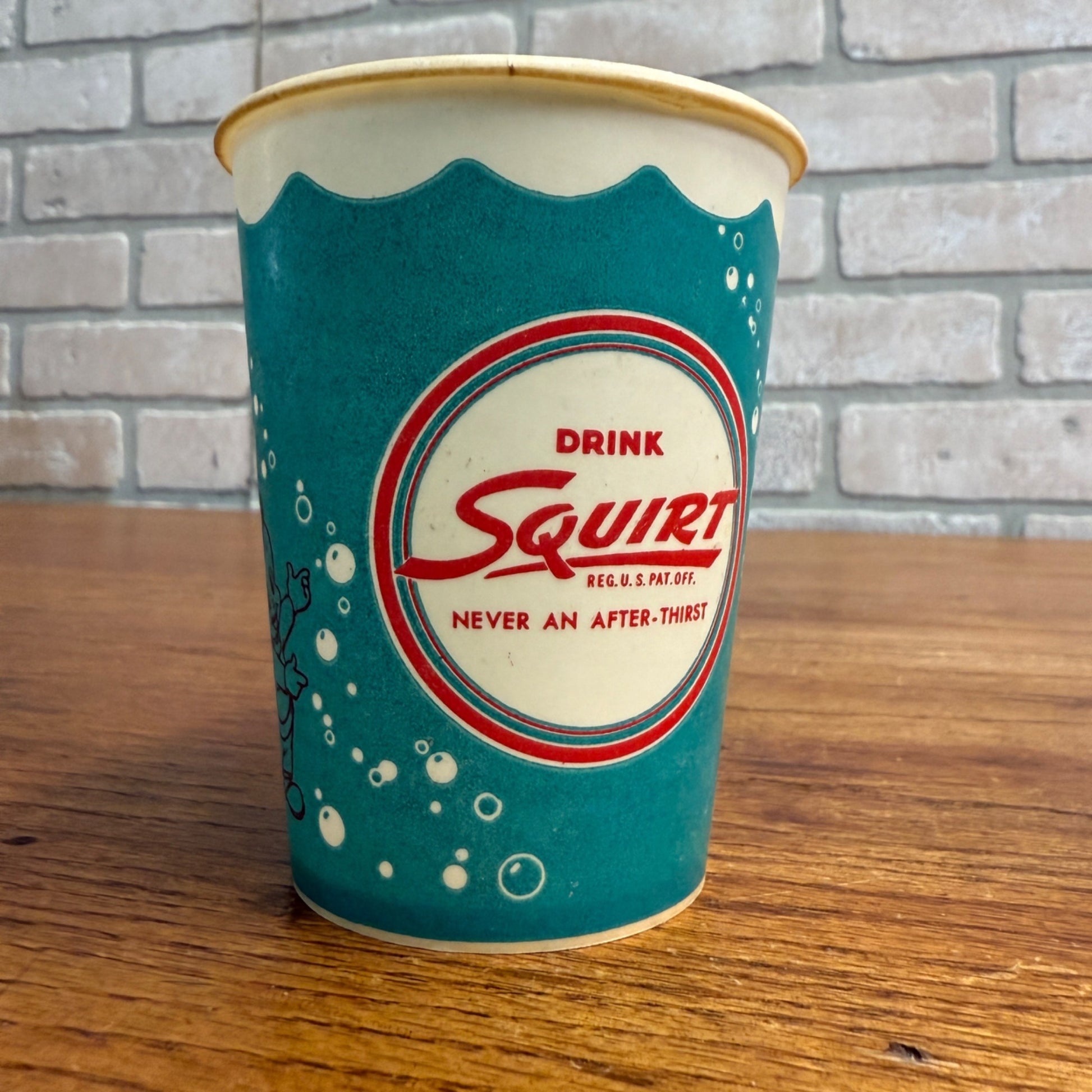 SCARCE 1950 Squirt 9oz Paper Wax Blue Promotional Cup w/ Squirty