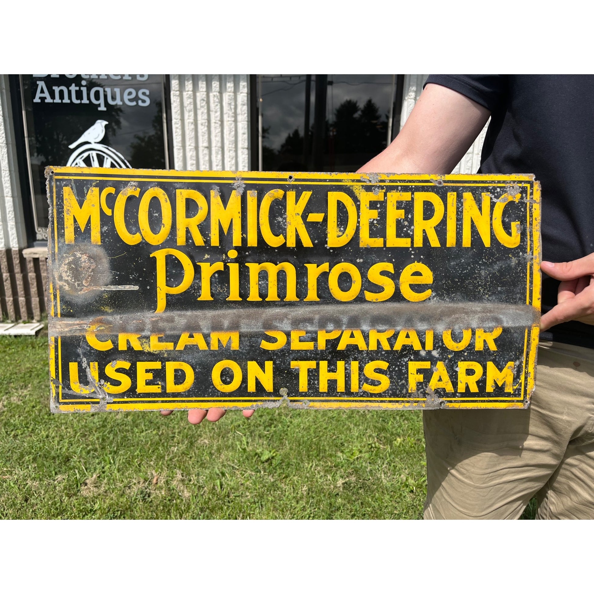 McCormick Deering Primrose Cream Separator Tin Embossed Farm Advertising Sign