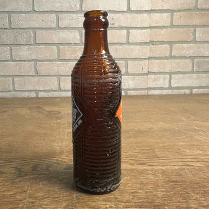 1951  7oz ORANGE CRUSH ACL AMBER SODA BOTTLE M. & S. BOTTLING CLINTON, IOWA