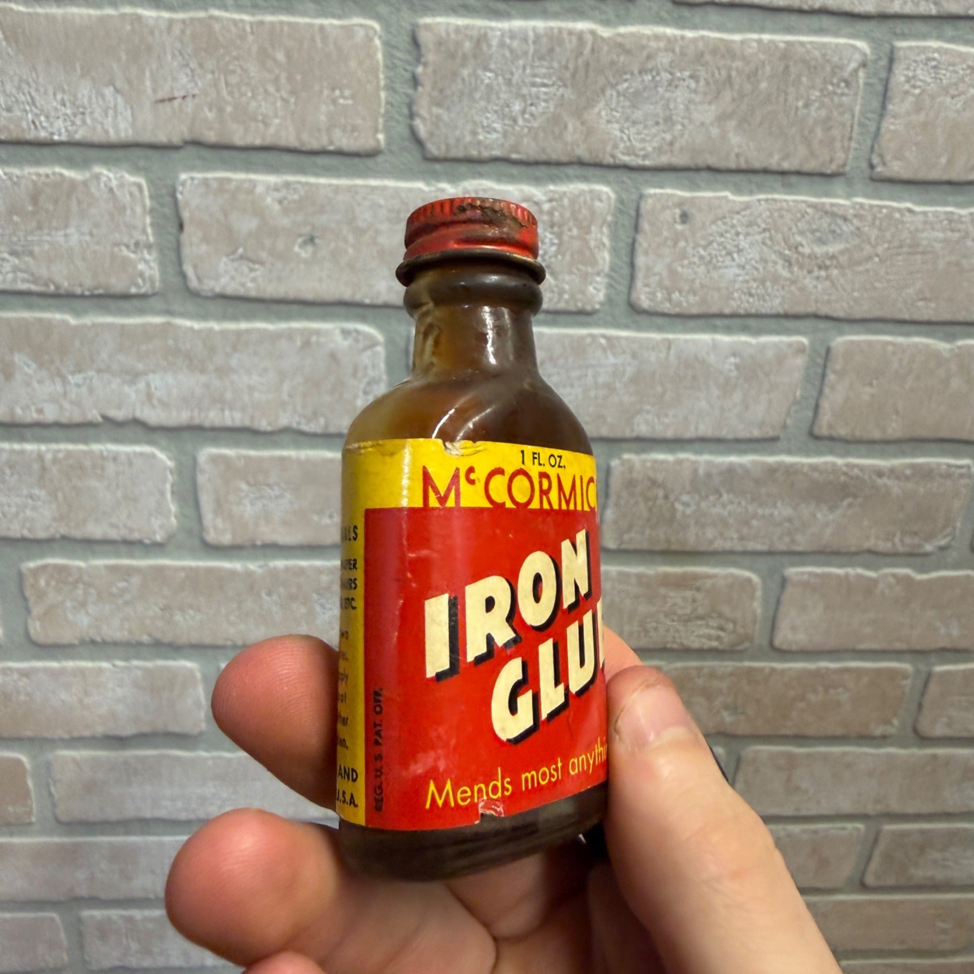 Vintage 1950's 1-1/4 oz McCormick's Iron Glue Mostly Full Small Bottle w Label