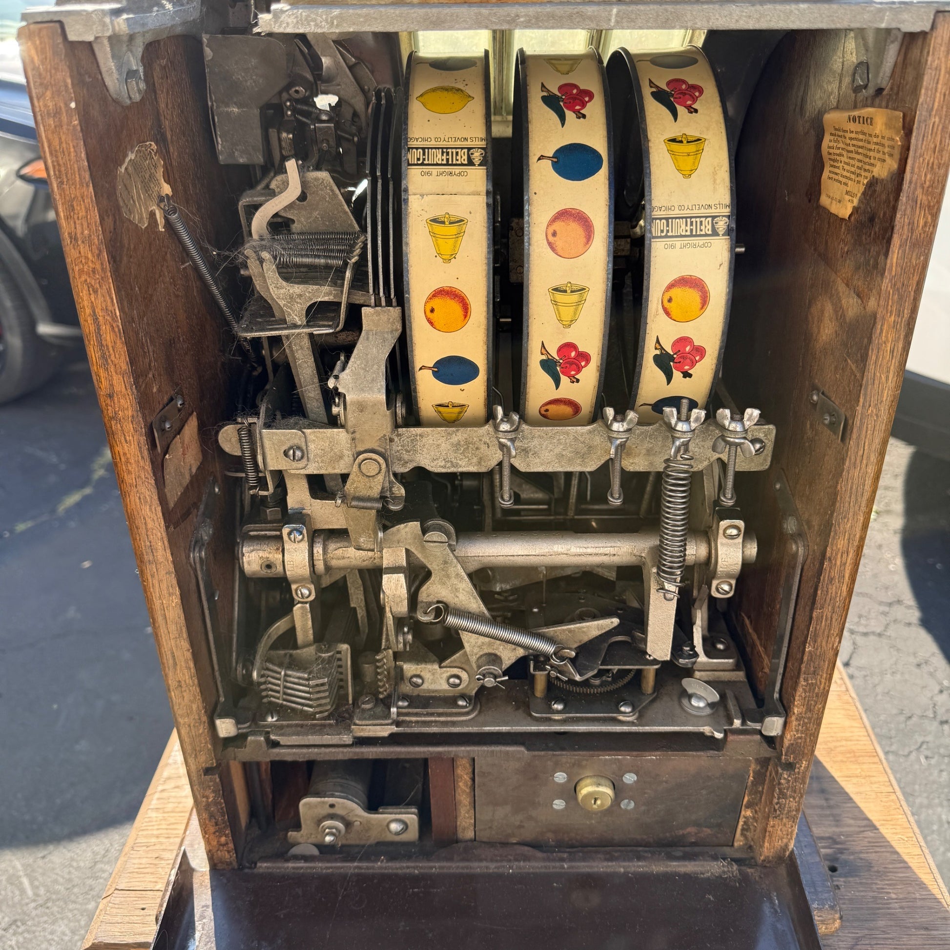 1930s 5¢ Mills Novelty Lion Head Slot Machine