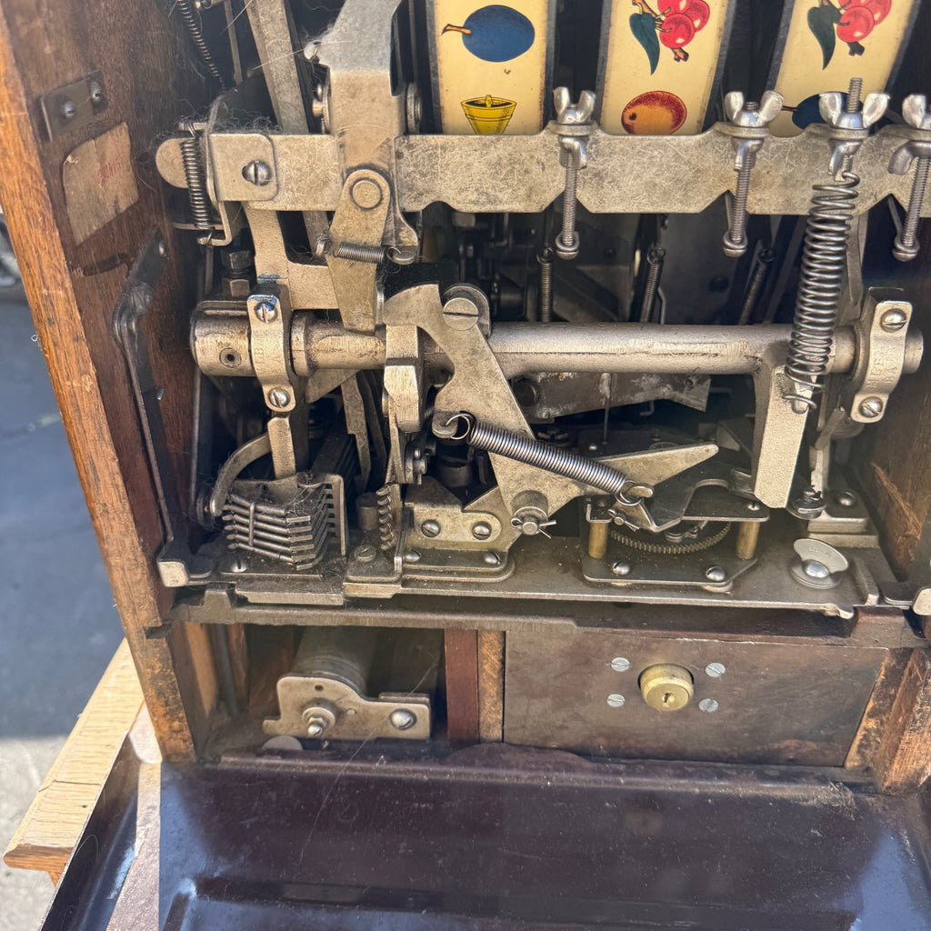 1930s 5¢ Mills Novelty Lion Head Slot Machine
