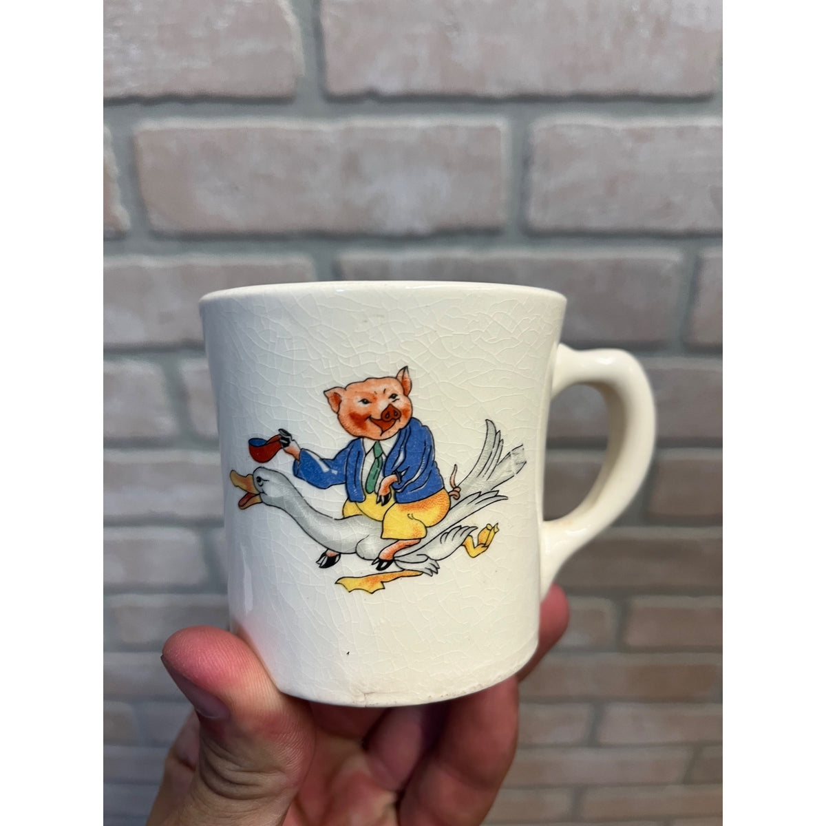 Vintage Children's Drinking Cup Glazed Pottery Mug Pig Riding Mother Goose Circa 1930 Syracuse China?