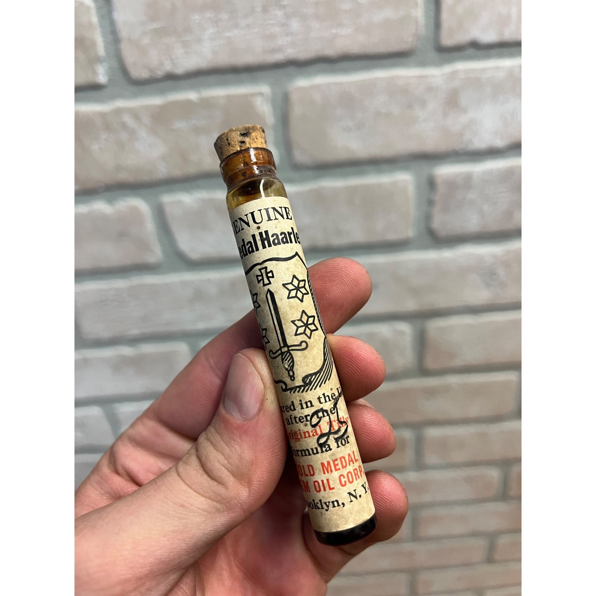 Vintagle Gold Medal Haarlem Oil Labeled Glass Medicine Bottle Tube Full Brooklyn, N.Y.